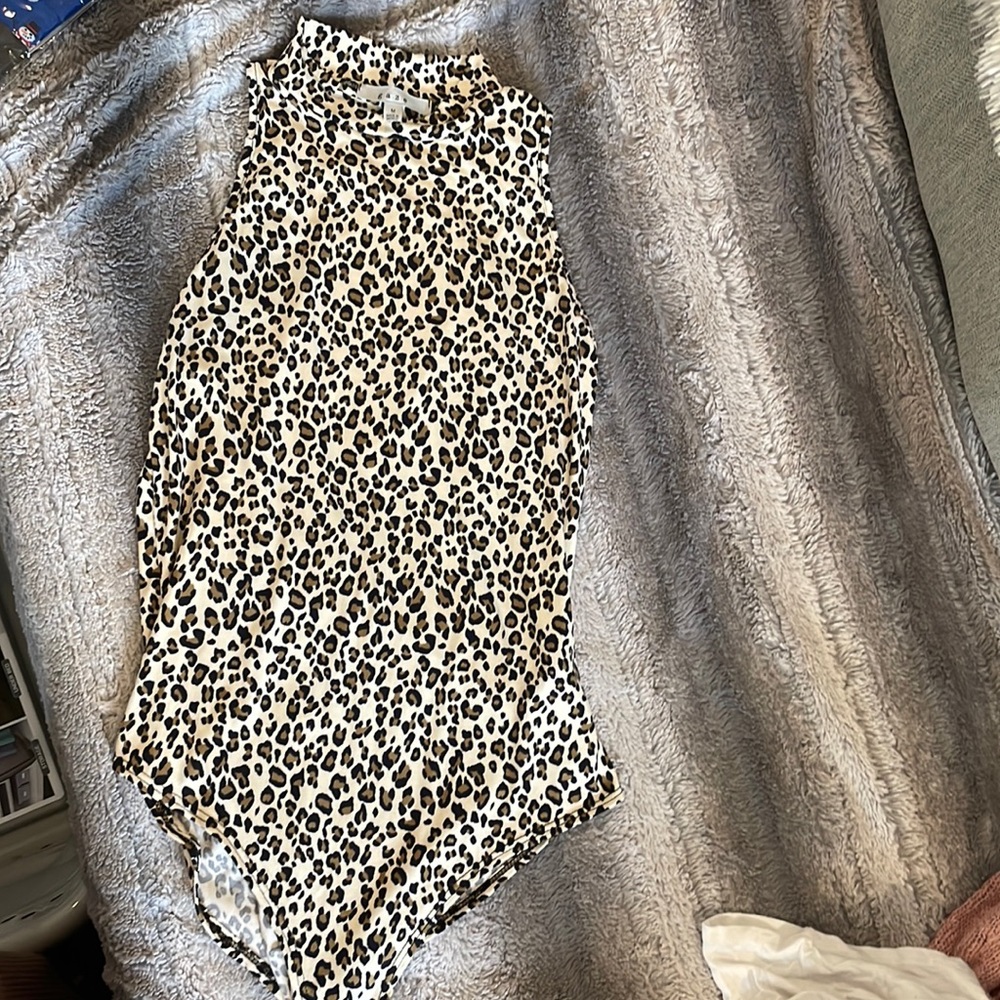Animal print bodysuit. Size medium. Never worn.
